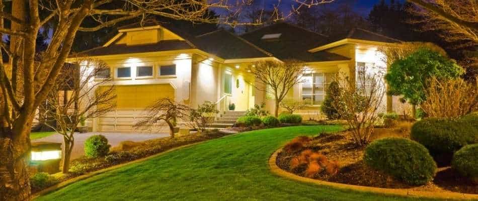 A Home Brightly Lit With Permanent Outdoor Lighting